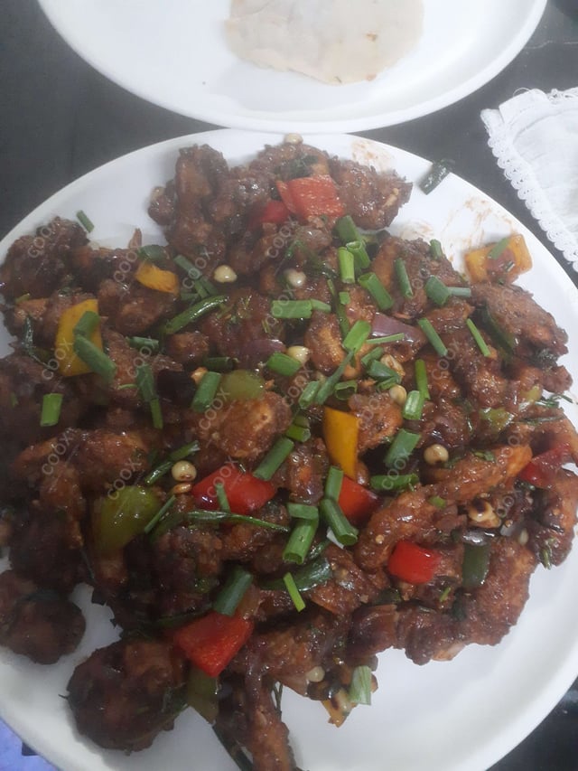 Delicious Kung Pao Chicken prepared by COOX