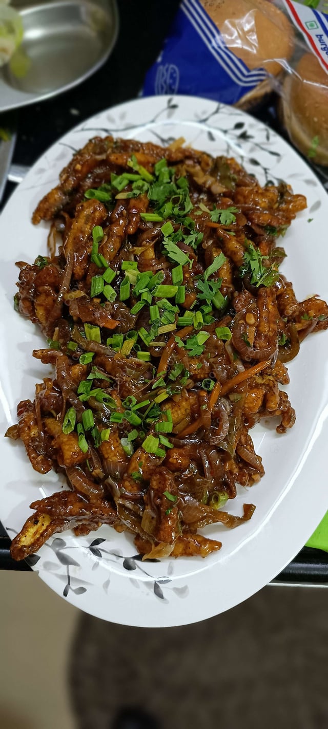 Delicious Crispy Chilli Baby Corn prepared by COOX