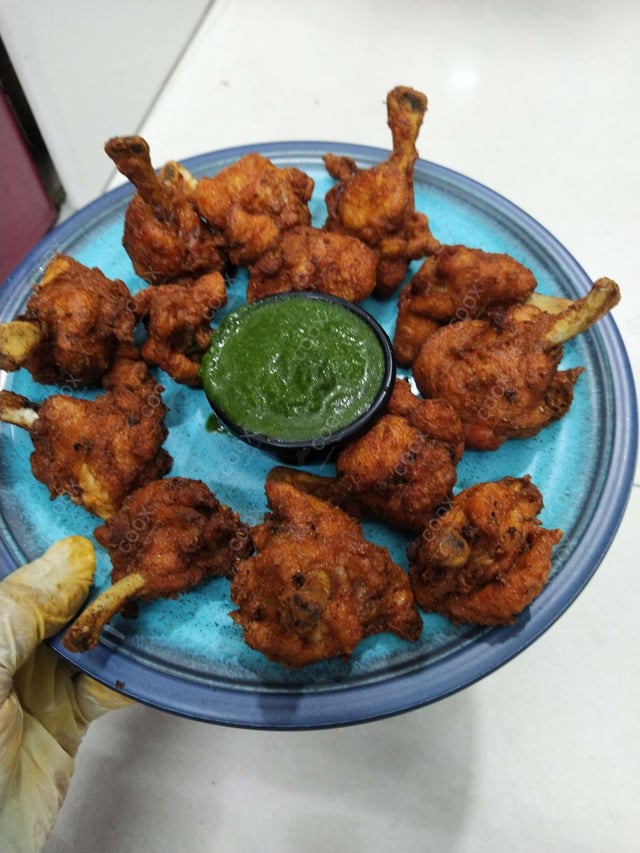 Delicious Chicken Lollipop prepared by COOX