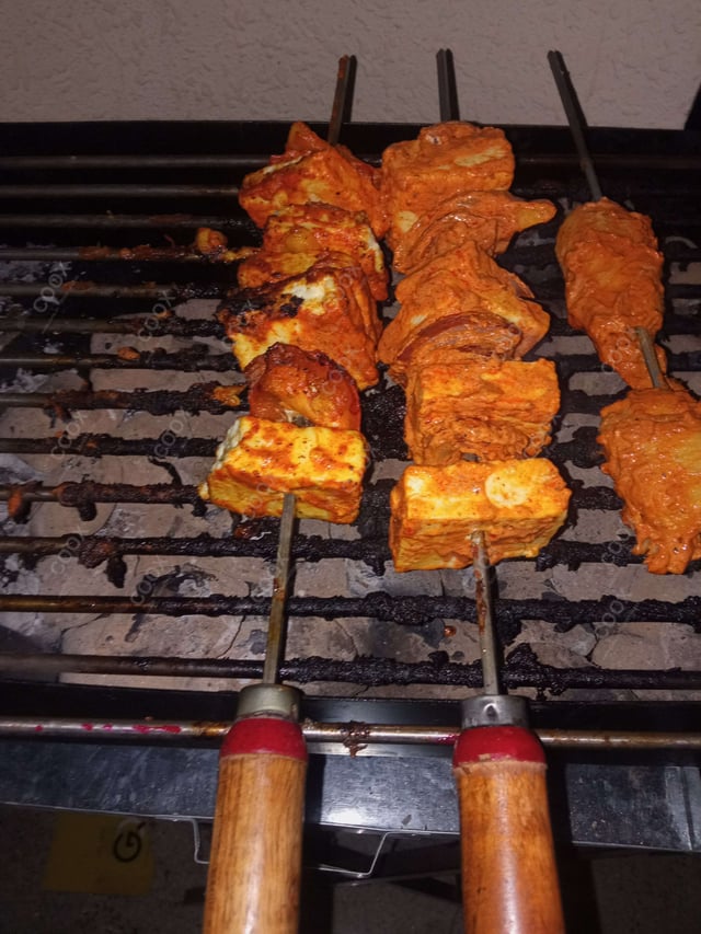 Delicious Paneer Tikka prepared by COOX