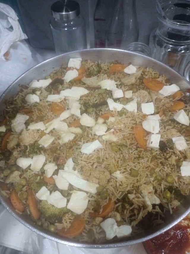 Delicious Veg Biryani prepared by COOX