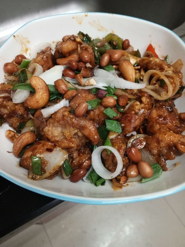 Delicious Kung Pao Chicken prepared by COOX