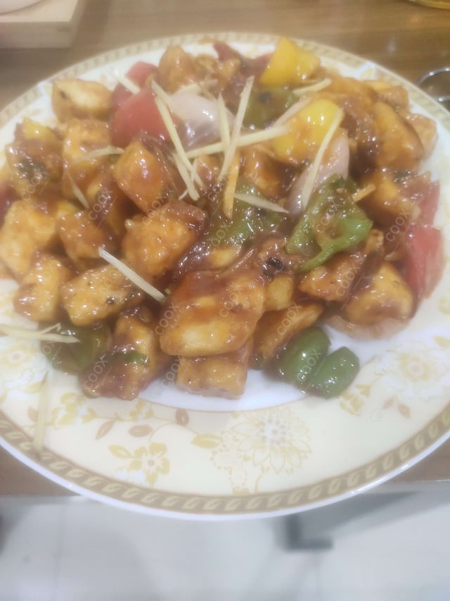 Delicious Chilli Paneer (Dry) prepared by COOX