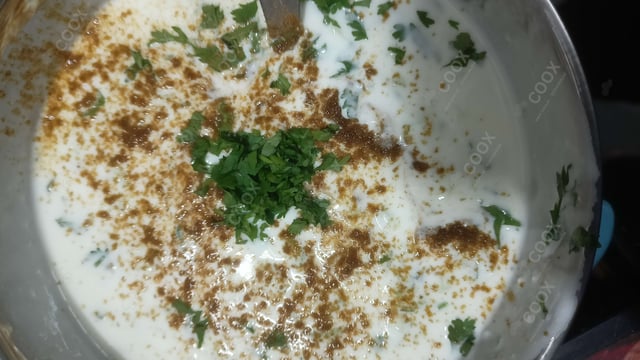 Delicious Cucumber Raita prepared by COOX