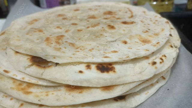 Delicious Lachha Parathas prepared by COOX