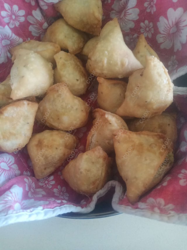 Delicious Mini Samosas prepared by COOX