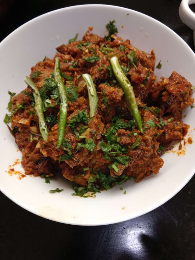 Delicious Mutton Sukha prepared by COOX