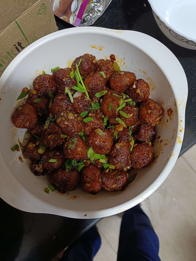 Delicious Veg Manchurian (Dry) prepared by COOX