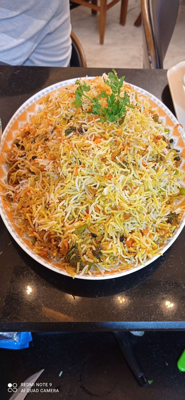 Delicious Veg Biryani prepared by COOX