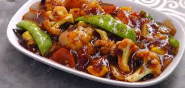 Delicious Mix Veg in Schezwan Sauce prepared by COOX