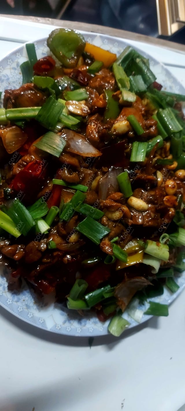 Delicious Kung Pao Chicken prepared by COOX