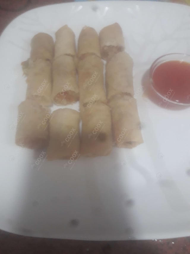 Delicious Veg Spring Rolls prepared by COOX