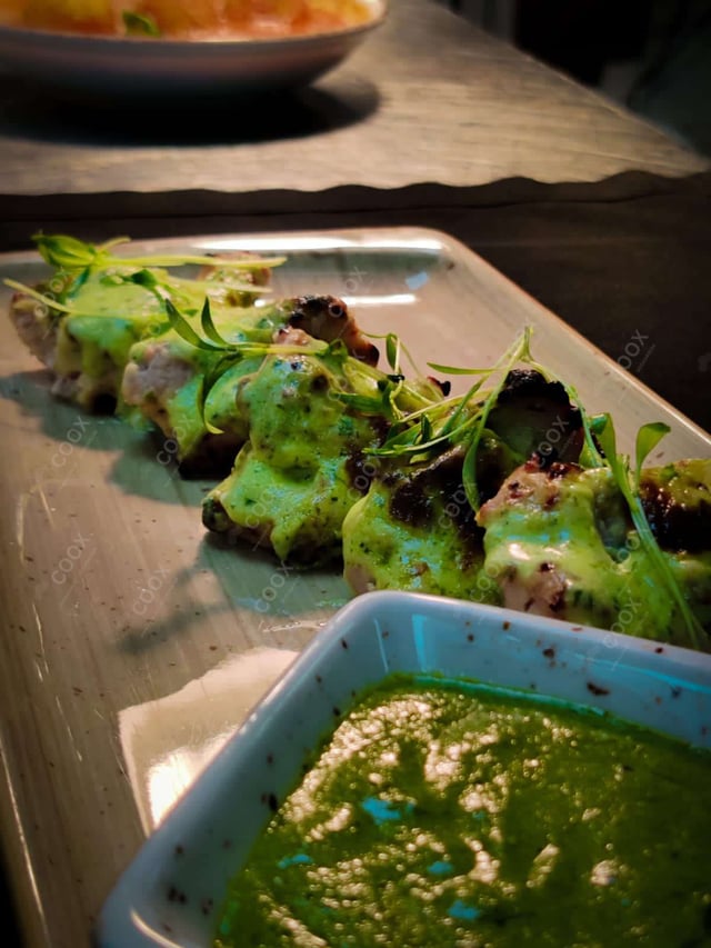 Delicious Murgh Malai Tikka prepared by COOX