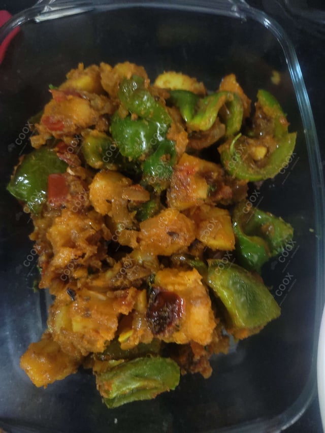 Delicious Aloo Shimla Mirch prepared by COOX