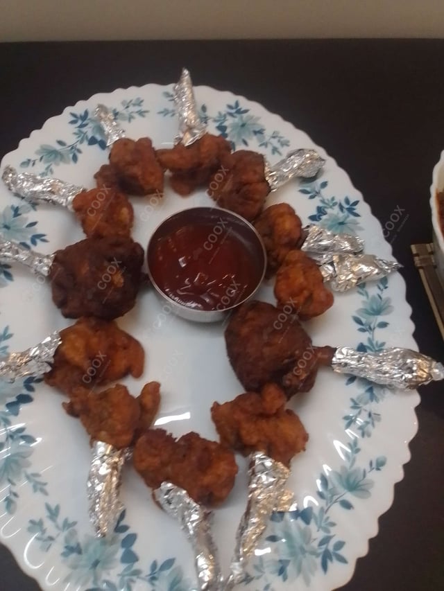 Delicious Chicken Lollipop prepared by COOX