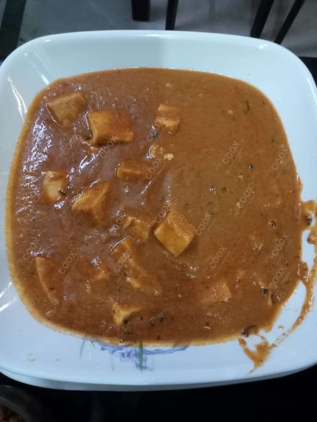 Delicious Paneer Butter Masala prepared by COOX