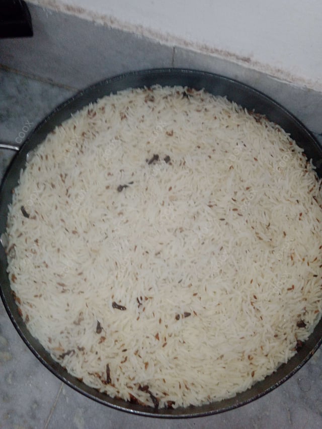 Delicious Jeera Rice prepared by COOX