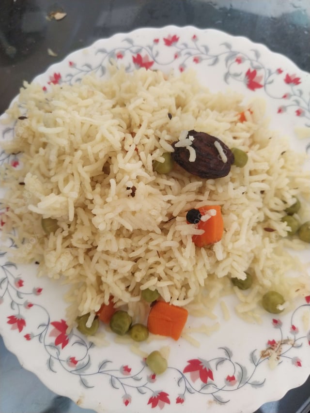 Delicious Veg Biryani prepared by COOX