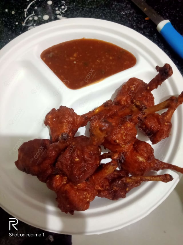 Delicious Chicken Lollipop prepared by COOX