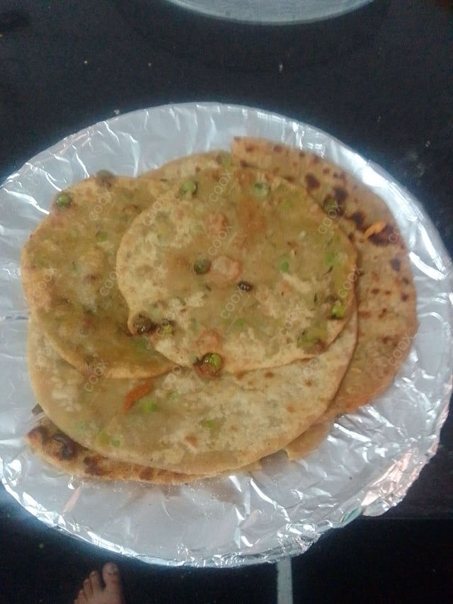 Delicious Stuffed Parathas prepared by COOX