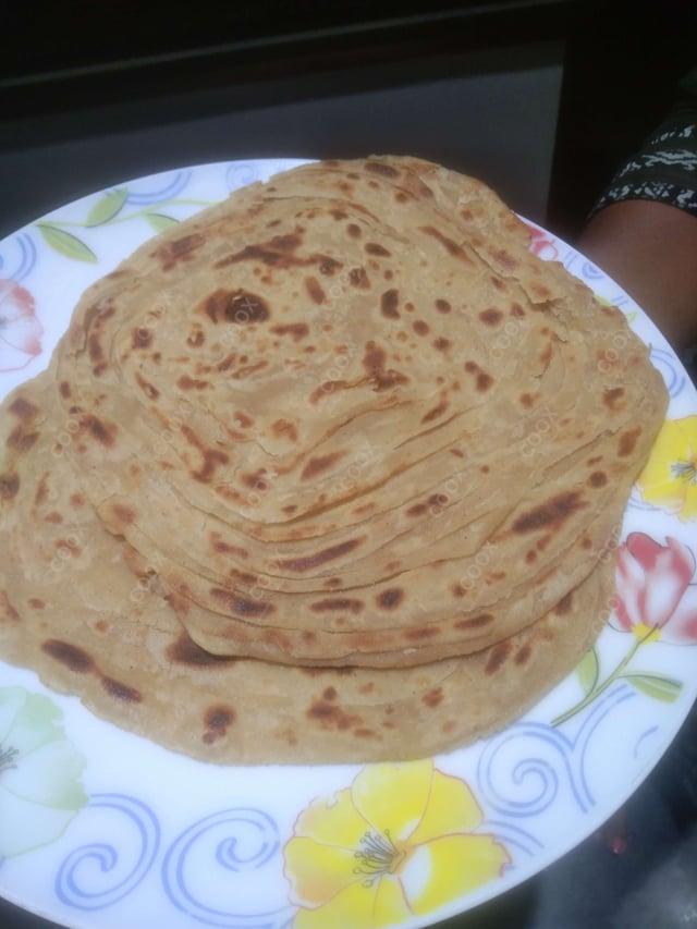 Delicious Lachha Paranthas & Rotis prepared by COOX