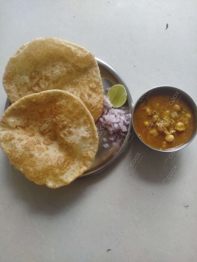 Delicious Chana Bhatura prepared by COOX