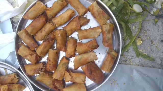 Delicious Chicken Spring Rolls prepared by COOX