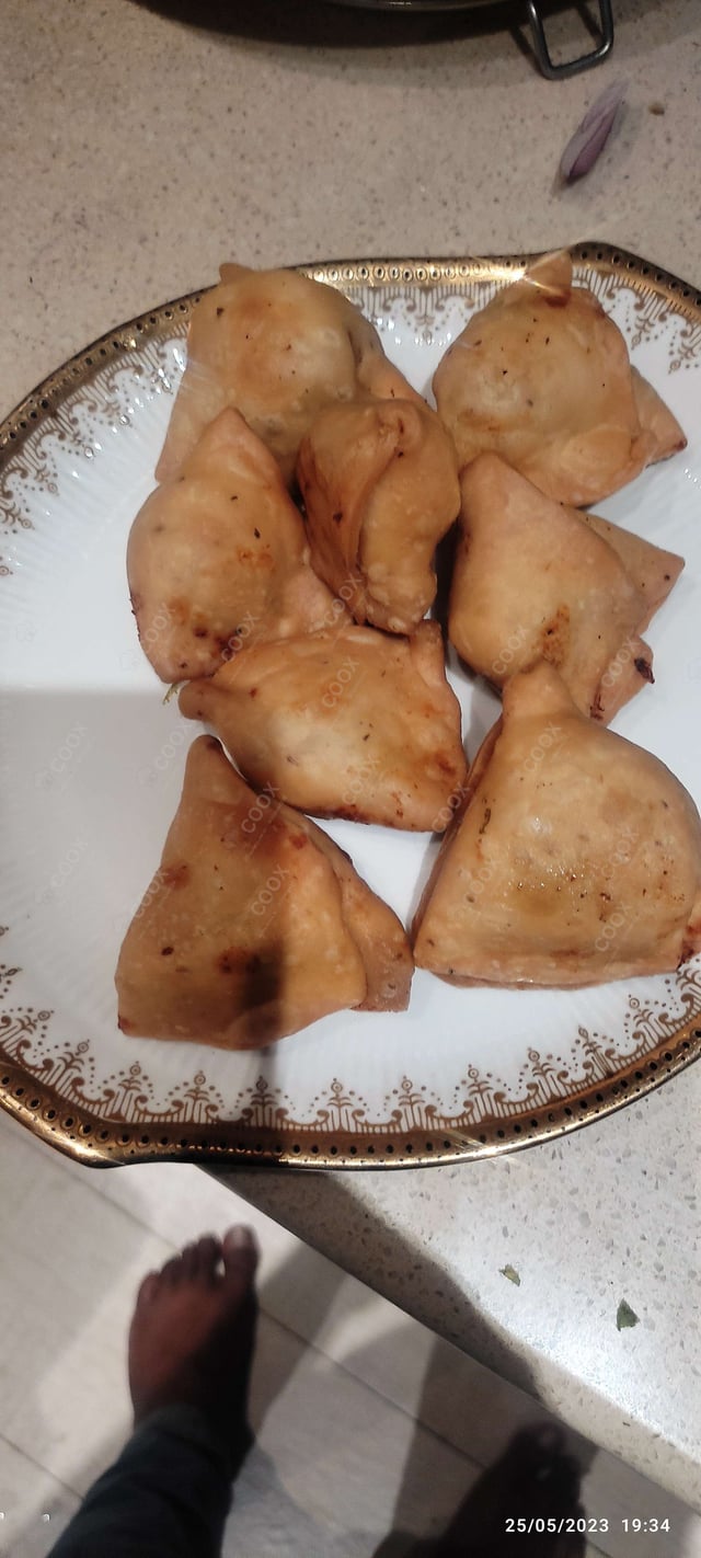 Delicious Mini Samosas prepared by COOX