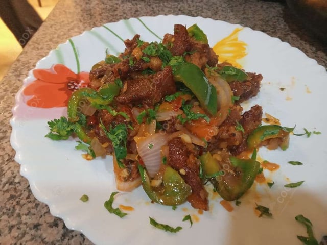 Delicious Crispy Chilli Lamb prepared by COOX