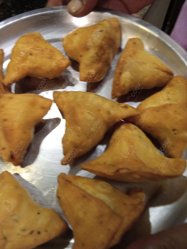 Delicious Mini Samosas prepared by COOX