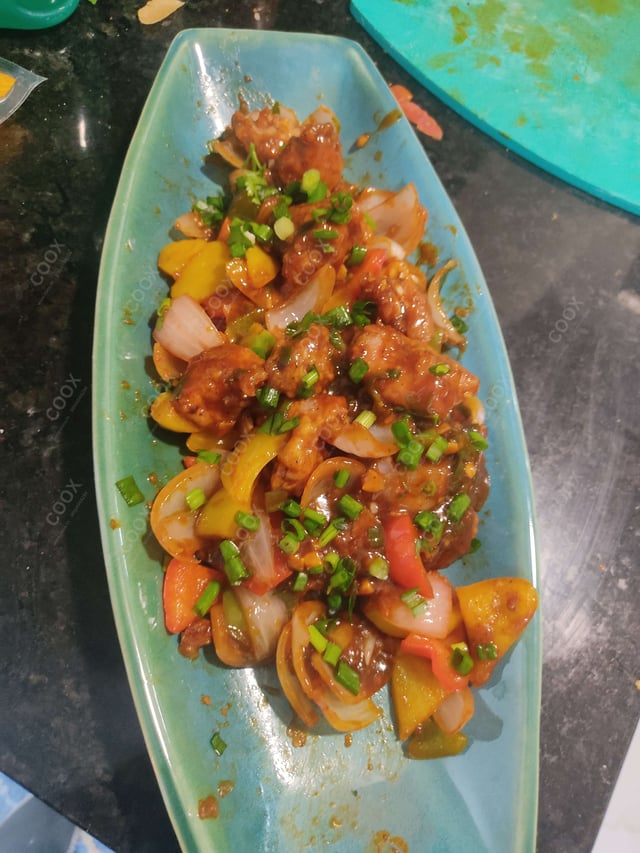 Delicious Chilli Chicken prepared by COOX