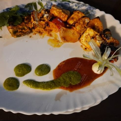 Delicious Paneer Tikka prepared by COOX