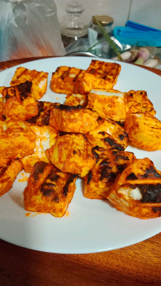 Delicious Paneer Tikka prepared by COOX