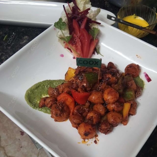 Delicious Mushroom Tikka prepared by COOX