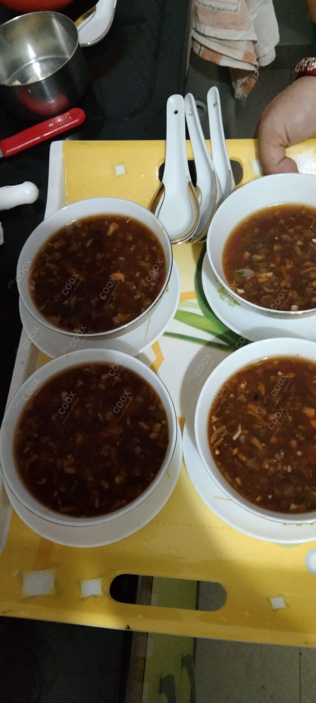 Delicious Vegetable Manchow Soup prepared by COOX