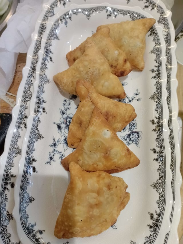 Delicious Mini Samosas prepared by COOX