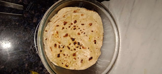 Delicious Tawa Rotis prepared by COOX