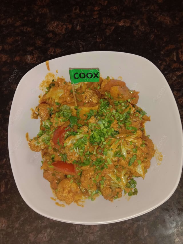 Delicious Aloo Gobhi prepared by COOX