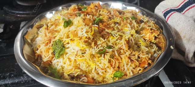 Delicious Veg Biryani prepared by COOX