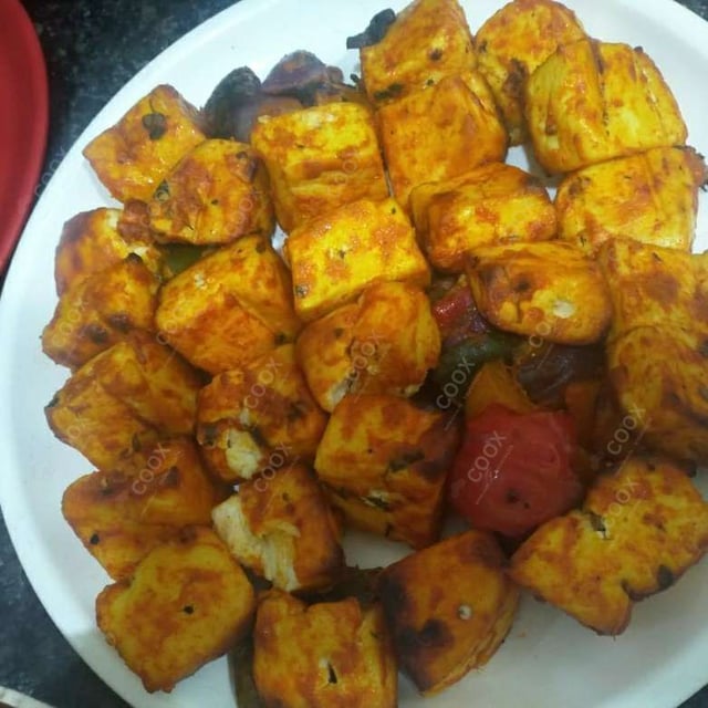 Delicious Paneer Tikka prepared by COOX