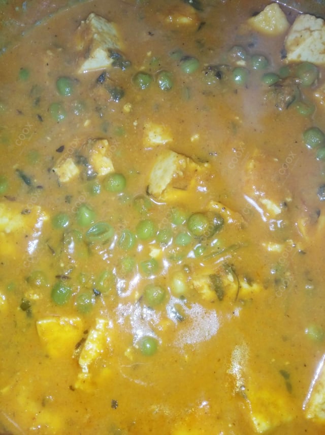 Delicious Matar Paneer prepared by COOX