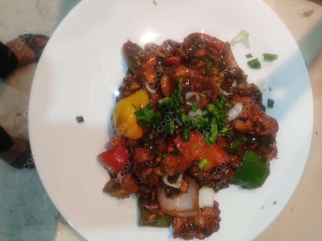 Delicious Kung Pao Chicken prepared by COOX