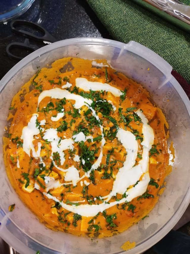 Delicious Paneer Butter Masala prepared by COOX