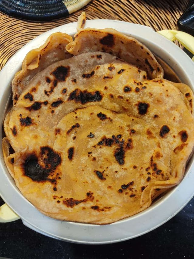 Delicious Lachha Paranthas & Rotis prepared by COOX