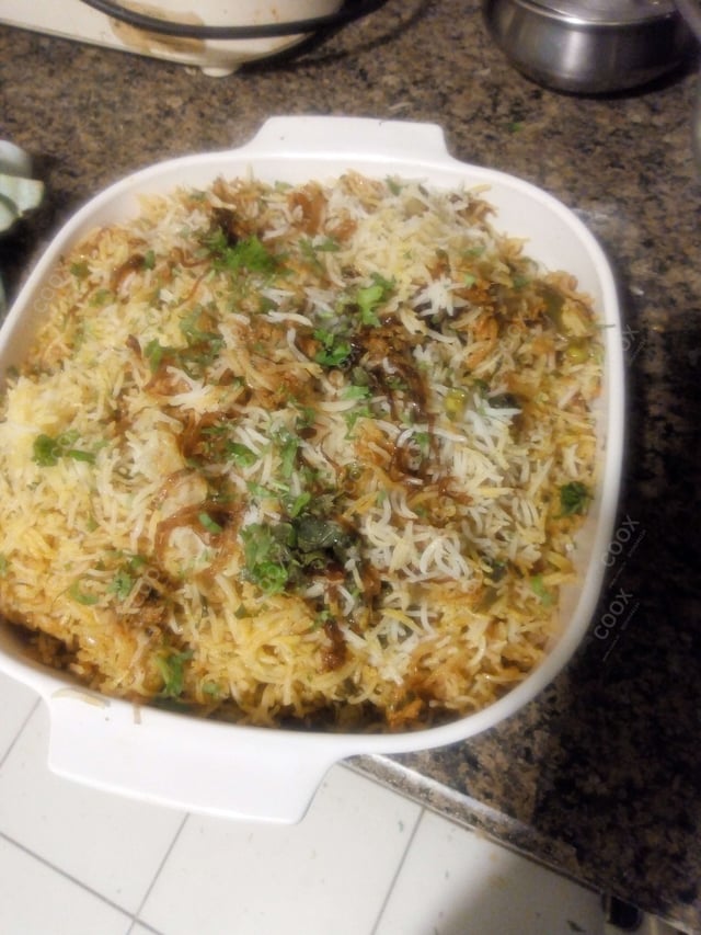 Delicious Veg Biryani prepared by COOX