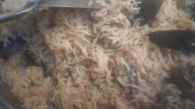 Delicious Chicken Biryani prepared by COOX