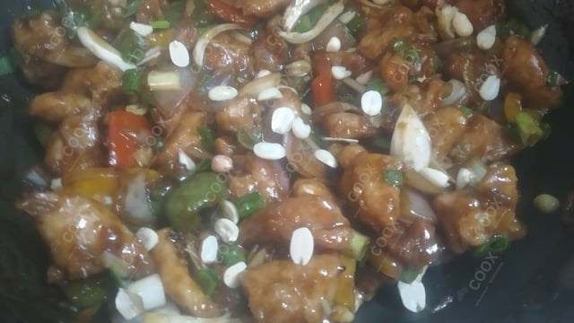 Delicious Kung Pao Chicken prepared by COOX