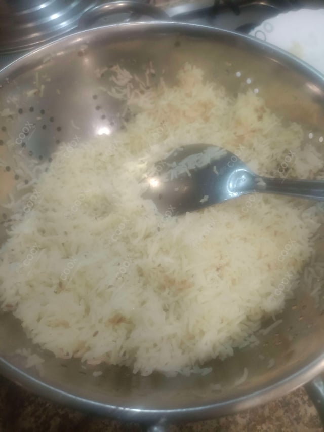 Delicious Jeera Rice prepared by COOX