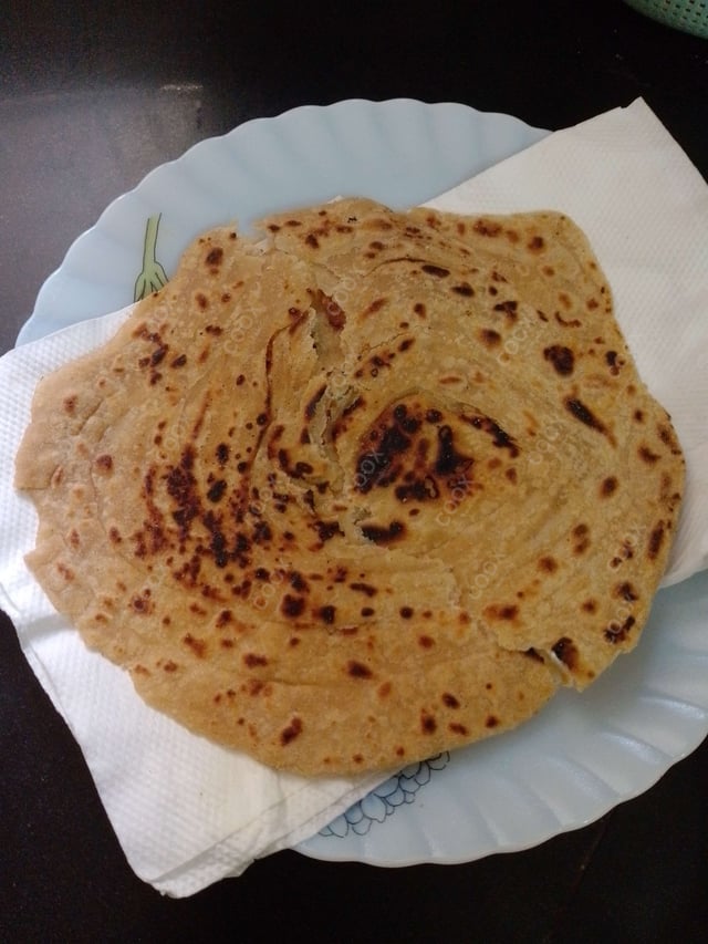 Delicious Lachha Parathas prepared by COOX