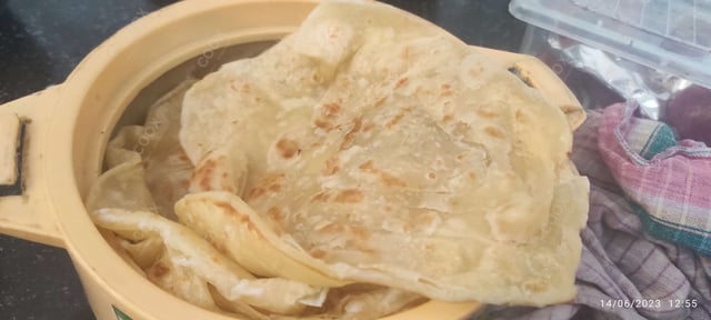 Delicious Lachha Parathas prepared by COOX